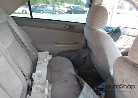 2002 Toyota Camry Le z USA, uszkodzony, nr VIN 4T1BE32K42U069839